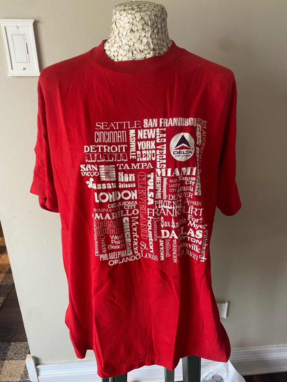 Vintage 80s Delta Airlines Red Graphic Tee with destination City Name Design